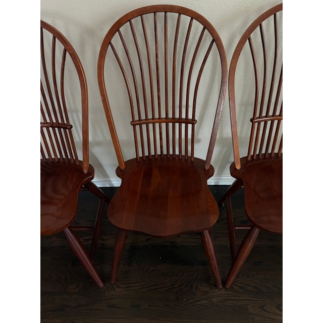 Handsome set of eight vintage Windsor dining chairs by Pennsylvania House, including six side chairs and two armchairs....