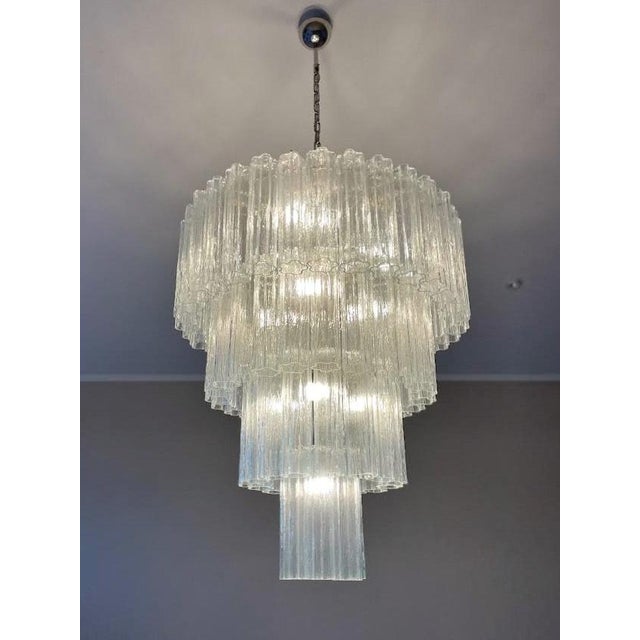 Murano glass chandelier with tubular glass prisms in clear glass. Contemporary chandelier in traditional italian mid-...