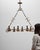 This 20th Century French Gothic Revival metal torch chandelier embodies the dramatic, handcrafted character associated...