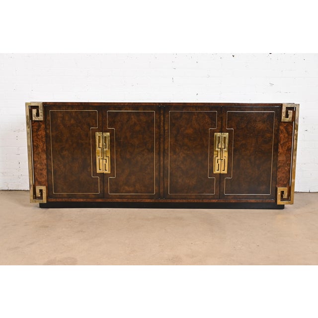 A gorgeous Mid-Century Modern Hollywood Regency sideboard, credenza, or bar cabinet. By William Doezema for Mastercraft...