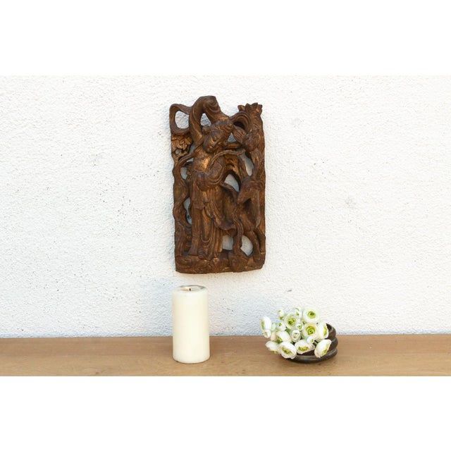 This wall panel is a masterfully executed work of 19th-century Chinese woodcraft. Hand-carved from solid camphor or...