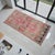 Welcome to our curated collection of authentic Anatolian textiles. This stunning small rug is a genuine hand-knotted piece...