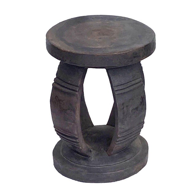 Superb hand-sculpted stool carved from a single piece of heavy solid wood by the Baga people of Guinea-Bissau. The Baga...