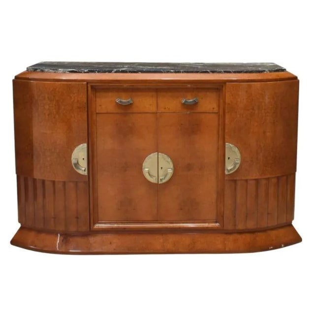 Exceptional French Art Deco elegant 1930's sideboard with inset marble top made out of amboyna burlwood in a high gloss...