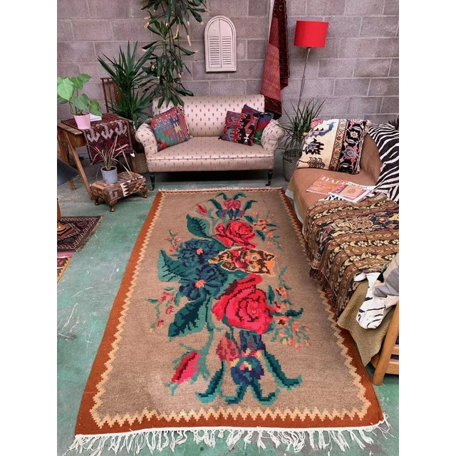 1960s Vintage Moldovan Kilim, very pretty with red roses and a really cute cat woven in to the centre. Usually woven by...
