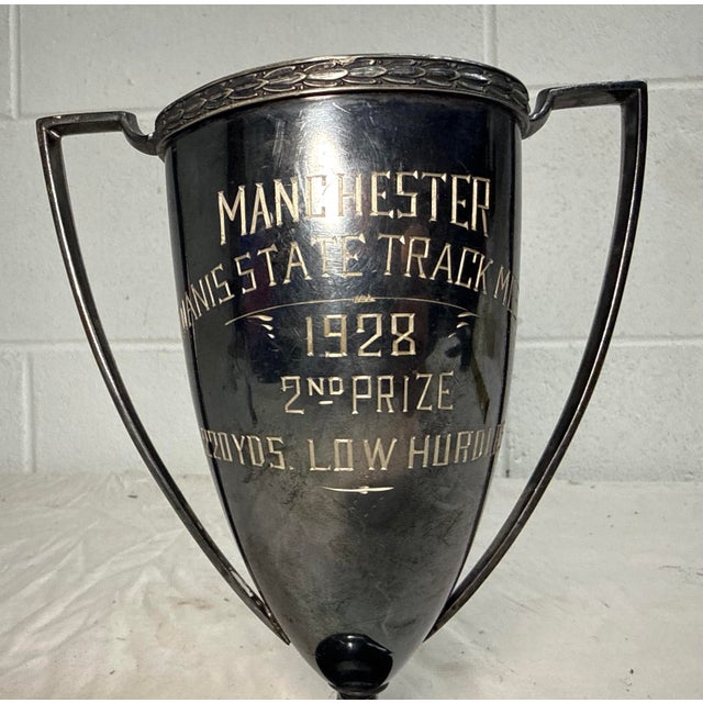 Up for sale is an exquisite antique silverplate trophy award from a 1928 Manchester 220 yds Low Hurdle track meet in the...