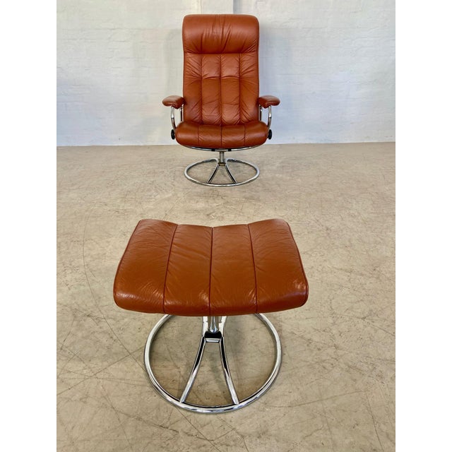 An exceptional example of Scandinavian craftsmanship from Ekornes Furniture, this beautifully designed reclining lounge...