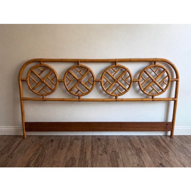 Bring timeless tropical elegance to a bedroom with this vintage king-size bamboo and rattan headboard featuring four...
