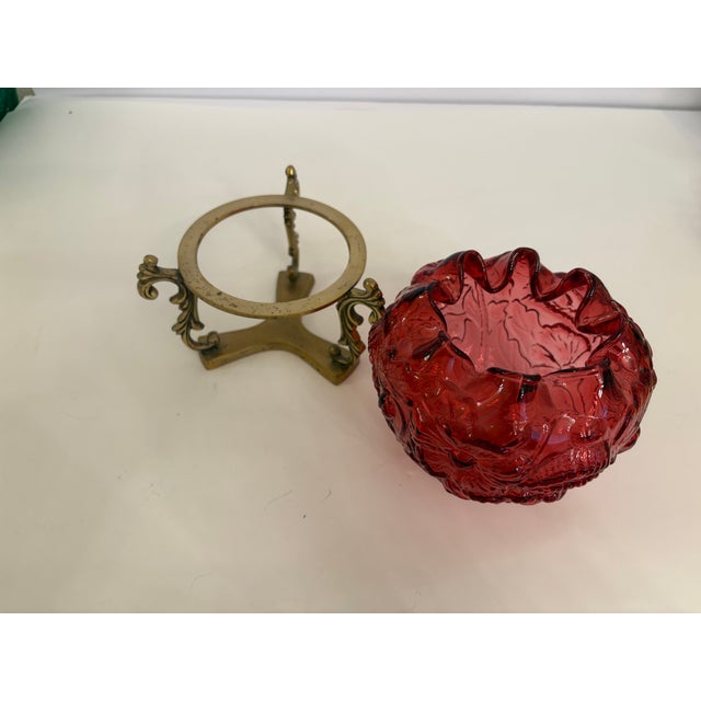 Cranberry red glass with a pattern of poppy by Fenton in Victorian style, ruffled edge and a crimped top. This lovely bowl...