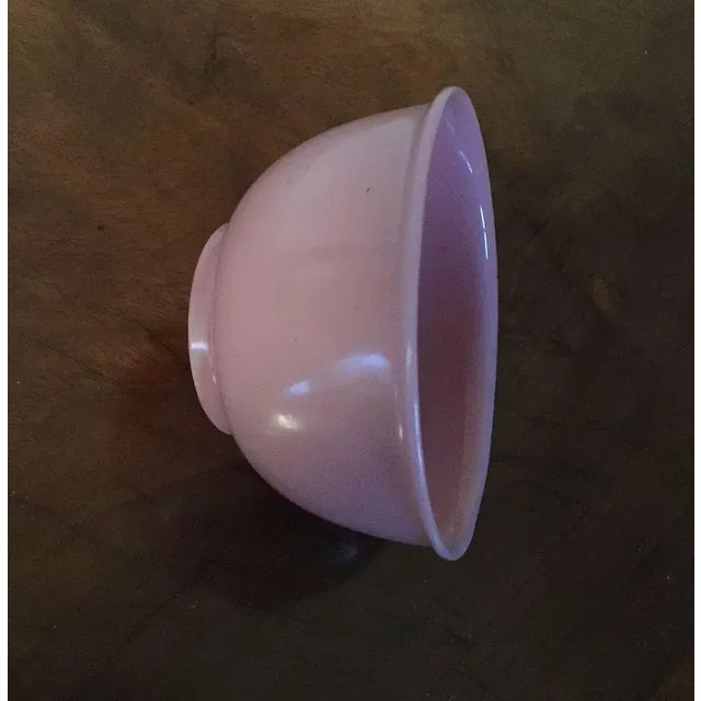 Antique 19th c. Chinese pink Peking glass bowl. Measures 4 1/2" diameter x 2 1/2" deep. Nice deep foot and bright color....