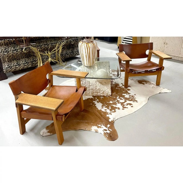 Vintage 1980s, this wedge-shaped tessellated Mactan stone coffee table exudes sculptural grandeur with textured...