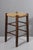 Attractive mid-20th century straw stool in the style of Charlotte Perriand's “Bauche” models. In very good condition, with...