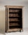 A refined example of Louis XV influence carried gracefully into the early nineteenth century, this French oak wardrobe...