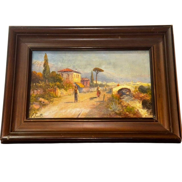 This evocative Italian landscape, attributed to Pietro Toretti, depicts a tranquil rural road set against characteristic...