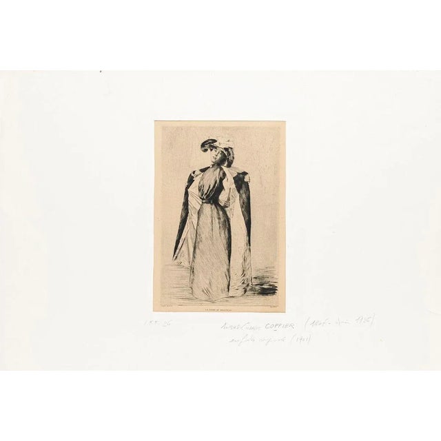 La Dame au Manteau is an original artwork realized in 1901 by the French artist André-Charles Coppier (1867 - 1948)....