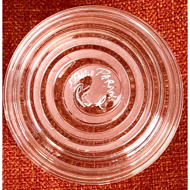 Beautifully hand blown glasses by an artist in Madison Wisconsin. You can see the variations on the bottom of each piece....