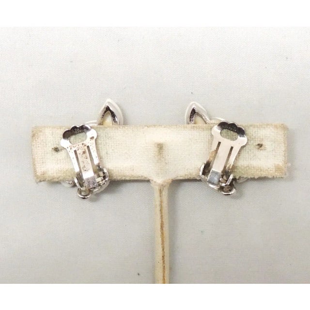 White Vintage Signed Boucher Rhodium Plated White Thermoset Leaves Clip Earrings - 2 Pieces For Sale - Image 8 of 9