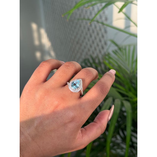 A striking expression of modern glamour, this aquamarine cocktail ring captivates with one luminous ice-blue aquamarine...