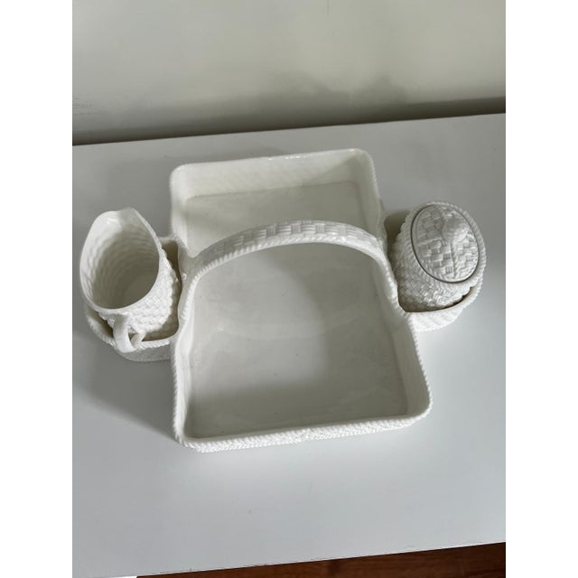 Crafted in Ireland in 1994 for Tiffany & Co., this elegant white ceramic serving piece features the signature "Tiffany...