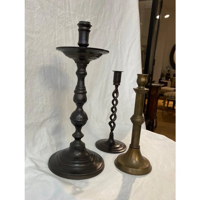 Set of 3 different Maitland Smith Vintage Candle holders. All brass with various finishes. The Braided one is 11" High,...