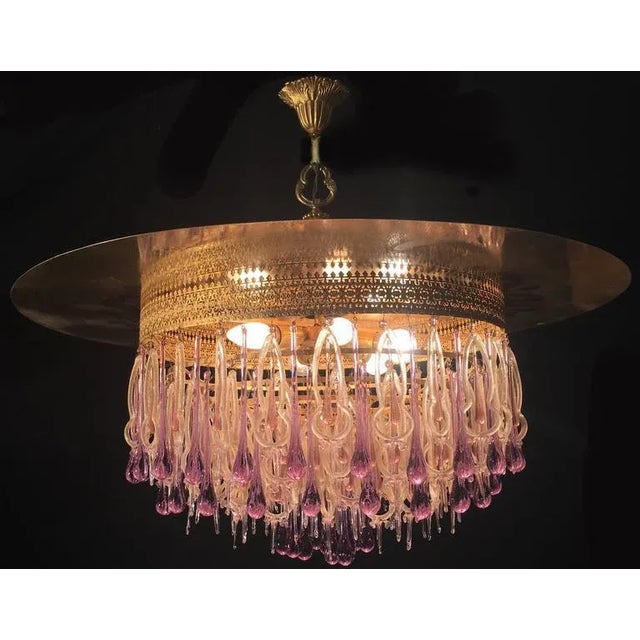 Extraordinary and rare chandelier attributed to Barovier and Toso composed of hundreds of elements in pure Murano glass...