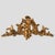 An exquisite French Louis XV giltwood ornament from the 18th century, richly carved in the Rococo style. The composition...