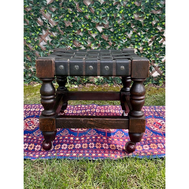 Gothic Vintage Spanish Revival Woven Leather Strap Rolling Footstool For Sale - Image 3 of 13