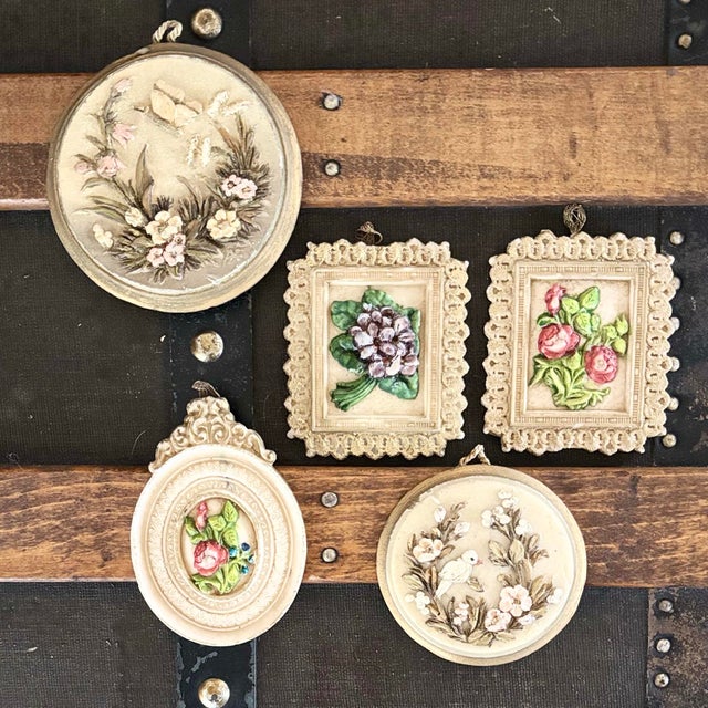 A pristine collection of eight German hand-painted wax relief wall plaques (Wachsbilder). Meticulously crafted in Bavaria...