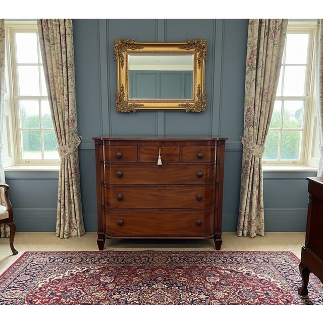 A superb George IV period mahogany chest of drawers. Of D-fronted form and very well constructed in solid mahogany with...