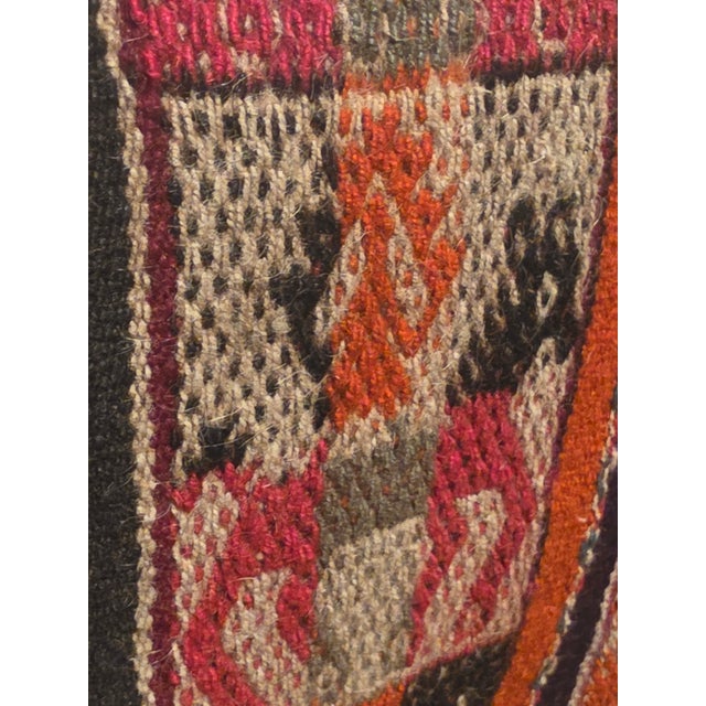 A distinctive handwoven Andean textile showcasing the rich artistry and traditional craftsmanship of Indigenous artisans....