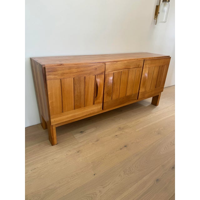 Maison Regain, sideboard, elm, France, 1970s. Sideboard attributed to Maison Regain combines a simplified yet complex...