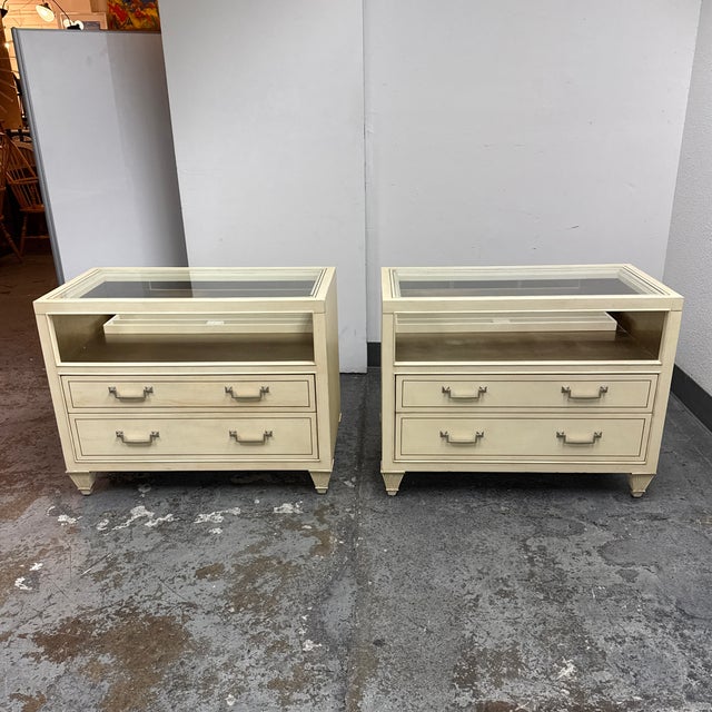 Design Plus Gallery presents a Pair of the New Traditional Glass Top Bedside Chests from Caracole. This matching pair...