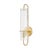 Beck takes Art Deco forms and gives them a modern minimalist aesthetic. Curved metal arms from the top and bottom of the...