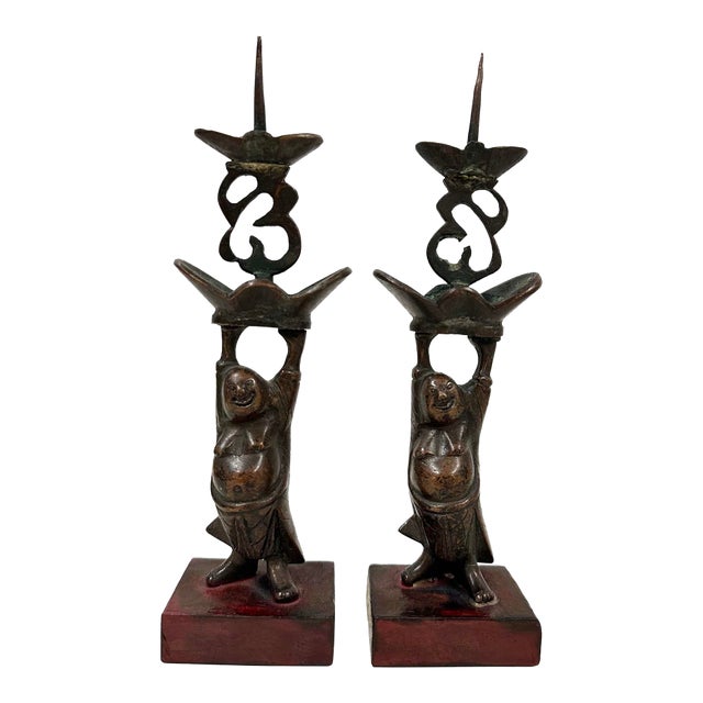 Early 20th Century Chinese Pair of Bronze Happy Buddha Candle Holders For Sale
