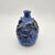 Studio pottery weed pot in mottled cobalt-blue glaze with sculptural applied floral relief, signed and marked "St. Albans,...