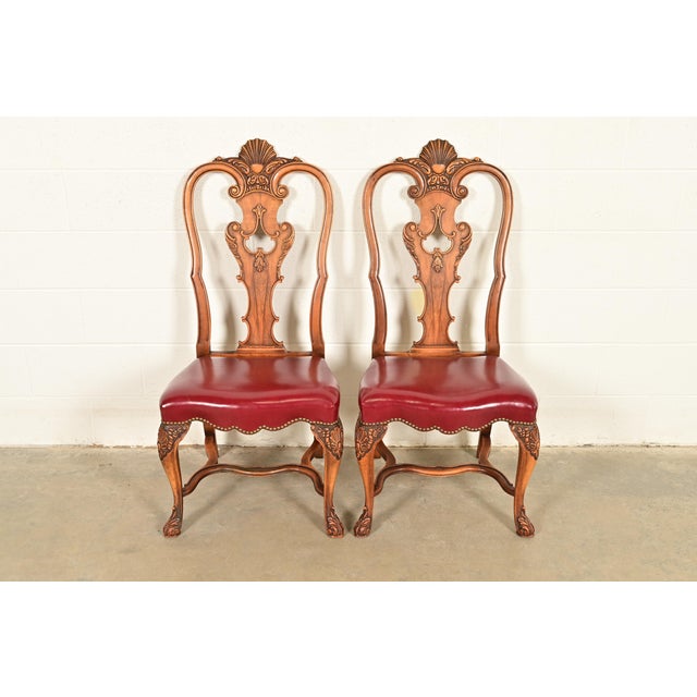 An outstanding pair of antique Georgian, Chippendale, or Queen Anne style side chairs or dining chairs By Berkey & Gay...