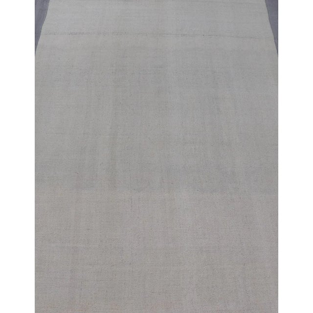 Measures: 5'1 x 7'4 This piece, although vintage, is perfect for modern interiors, with minimalism on the high rise of...