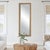 Bring the outside indoors with faux rattan. Surrounding the 1" beveled mirror is a thin frame liner to complement the...