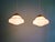 Pair of Art Deco pendant lights with two white opaline glass globes, 1930s. Each light has been restored and is compatible...