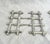 Vintage pair of silver faux bamboo trivets that can expand. Perfect for those hot dishes. 7.25in square to 8.75 when...