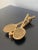 A beautiful cast brass door knocker in the form of two tennis rackets and a tennis ball. USA, Mid-20th Century Measures:...