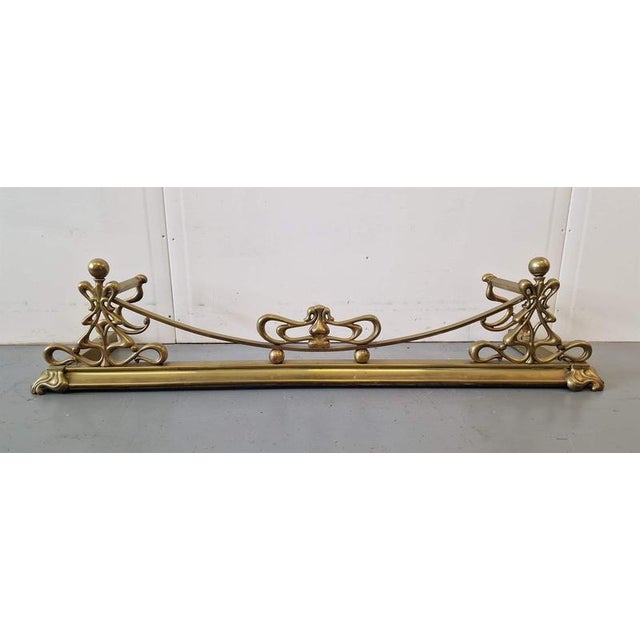 Art Nouveau fireplace element.Brass.France.1890s.Size: height 32cm; length 137cm; depth 40cm