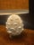 A striking matched pair of vintage white ceramic artichoke table lamps with deeply sculpted overlapping leaves and...