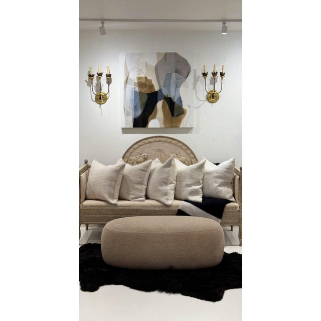 A classic Swedish bench with additional visual interest provided by a half-moon shape at the back. The magical image is of...