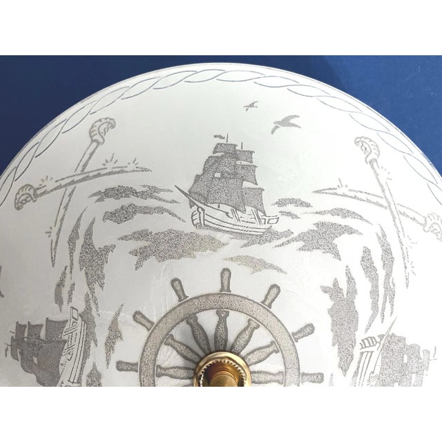 Fabulous 1960s frosted and textured glass ceiling light embossed with masted sailing ships, waves, crossed swords, central...