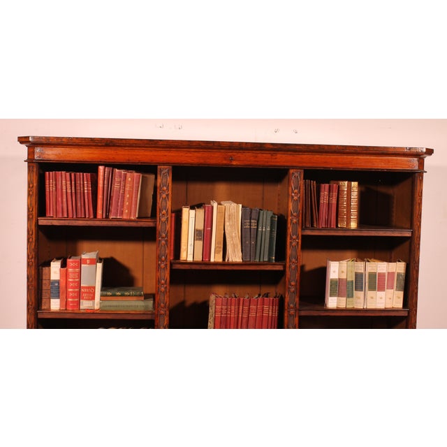 Elegant and rare large open oak bookcase from 19th century England. A very beautiful and uncommon large model. Indeed,...