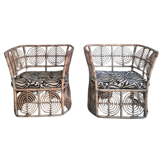 A wonderful set of rattan chairs, with whimsical pattern. Designed by Christer Norman for Sjöwall korgmakeri. Sweden...