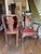 Pretty Queen Anne dining chairs featuring splat backs, ball and claw feet, and carved wooden cabriole legs with a shell...