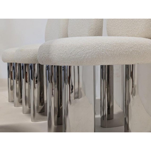 A unique chair with upholstered seat and shining legs to create a statement while dining. The Kadiev chair is the ultimate...