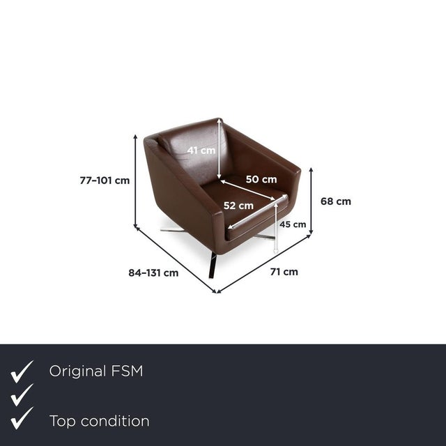 Here you get a lounge chair from FSM, whose cubic shape and brown leather add a modern touch to your living room. The...